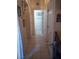 Hallway with tile flooring, leading to various rooms in the home, with neutral wall color at 10525 Autumn Pine Ave # 203, Las Vegas, NV 89144
