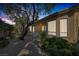 Nicely landscaped backyard providing shade and tranquility on a sunny day at 11763 Kingsland Ave, Las Vegas, NV 89138