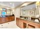 Bathroom boasting dual sinks, vanity area, and a glass enclosed shower at 125 E Harmon Ave # 1620, Las Vegas, NV 89109