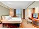 Bright bedroom featuring a large window with scenic views and a convenient work desk at 125 E Harmon Ave # 1620, Las Vegas, NV 89109