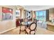 Living space showcasing a round dining table with chairs, comfortable seating area, and scenic views at 125 E Harmon Ave # 1620, Las Vegas, NV 89109