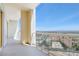 This balcony offers stunning city views from behind its transparent glass railing at 125 E Harmon Ave # 2514, Las Vegas, NV 89109