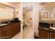 Bathroom with dual vanities and a separate toilet room at 125 E Harmon Ave # 2514, Las Vegas, NV 89109