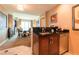 Kitchenette with a sink, dishwasher, and dark countertops at 125 E Harmon Ave # 2514, Las Vegas, NV 89109