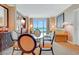 Living room features a dining table and ocean views at 125 E Harmon Ave # 2514, Las Vegas, NV 89109