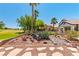 Backyard landscape with desert vegetation and a golf course view at 1253 Country Club Dr, Laughlin, NV 89029