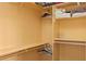 Walk-in closet featuring built-in shelving and ample storage space for clothes and accessories at 1253 Country Club Dr, Laughlin, NV 89029