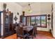 Formal dining room with tile floors, ample natural light, and stylish decor at 1253 Country Club Dr, Laughlin, NV 89029