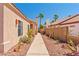 Beautiful home exterior featuring desert landscaping and a private courtyard at 1253 Country Club Dr, Laughlin, NV 89029