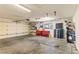 Clean and organized garage with ample storage and a well-lit workspace at 1253 Country Club Dr, Laughlin, NV 89029