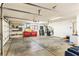 Large garage space featuring shelving, tool boxes, and plenty of room for parking and storage at 1253 Country Club Dr, Laughlin, NV 89029