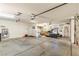 Spacious garage featuring ample storage space, overhead lighting, and an automatic door opener at 1253 Country Club Dr, Laughlin, NV 89029