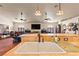 Open kitchen features an island and seamlessly connects living spaces. Great layout for entertaining at 1253 Country Club Dr, Laughlin, NV 89029