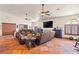 Spacious living room with tile flooring, comfortable seating, and ample natural light at 1253 Country Club Dr, Laughlin, NV 89029