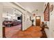 Inviting living room with terra cotta tile floors and open archways at 1253 Country Club Dr, Laughlin, NV 89029