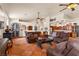 Open living area with comfortable seating, tile floors, and views of the kitchen and dining areas at 1253 Country Club Dr, Laughlin, NV 89029