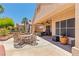 Spacious outdoor patio with ceiling fans and dining set at 1253 Country Club Dr, Laughlin, NV 89029