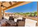Inviting outdoor patio with lounge chairs and golf course view at 1253 Country Club Dr, Laughlin, NV 89029