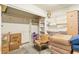 Well-organized storage room with built-in shelving and ample space for storing personal belongings at 1253 Country Club Dr, Laughlin, NV 89029