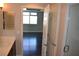 Bathroom with modern fixtures, vanity, and a view into the bedroom at 150 N Las Vegas Blvd # 1217, Las Vegas, NV 89101