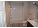 Full bathroom featuring a tub, toilet, sink with modern fixtures, and tiled flooring at 150 N Las Vegas Blvd # 1217, Las Vegas, NV 89101