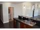 Kitchen featuring stainless steel appliances, dark granite countertops, and a breakfast bar at 150 N Las Vegas Blvd # 1217, Las Vegas, NV 89101