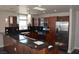 Modern kitchen featuring stainless steel appliances, dark granite countertops, and custom wood cabinetry at 150 N Las Vegas Blvd # 1217, Las Vegas, NV 89101