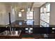Spacious living room with dark hardwood floors, large windows, and modern lighting fixtures for an elegant, airy feel at 150 N Las Vegas Blvd # 1217, Las Vegas, NV 89101