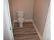 Modern toilet in neutral-toned bathroom with marble tile flooring and clean, simple design at 150 N Las Vegas Blvd # 1217, Las Vegas, NV 89101