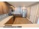 Spacious kitchen with stainless steel appliances, quartz countertops, gray cabinets, and white door at 150 N Las Vegas Blvd # 2302, Las Vegas, NV 89101