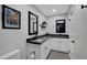 Bathroom featuring a double sink vanity and white cabinetry at 1575 W Warm Springs Rd # 1124, Henderson, NV 89014