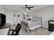Cozy bedroom featuring a modern metal bed frame and wood-look laminate floors at 1575 W Warm Springs Rd # 1124, Henderson, NV 89014