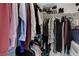 Walk-in closet with clothing racks, shelves, and ample storage space for shoes and accessories at 1575 W Warm Springs Rd # 1124, Henderson, NV 89014