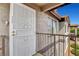 Apartment front door with security gate and gold hardware, located at 1124 at 1575 W Warm Springs Rd # 1124, Henderson, NV 89014