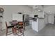 Open kitchen featuring stainless steel appliances and white cabinets at 1575 W Warm Springs Rd # 1124, Henderson, NV 89014