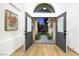 Inviting entryway with double doors, decorative transom window, and view of the private courtyard at 1594 Pontine Ct, Henderson, NV 89052