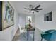 Bright office space features a stylish desk, modern decor, and a window view at 1594 Pontine Ct, Henderson, NV 89052