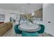 Bright, open-concept kitchen featuring a center island and seamless flow to the dining area at 1594 Pontine Ct, Henderson, NV 89052