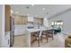 Kitchen featuring an island with seating, stainless steel appliances, and contemporary-style cabinets at 1594 Pontine Ct, Henderson, NV 89052