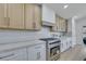 Modern kitchen featuring stainless steel appliances, stylish cabinetry, and a sleek countertop at 1594 Pontine Ct, Henderson, NV 89052