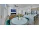 Open concept living space with fireplace, connected to the kitchen area, and modern decor at 1594 Pontine Ct, Henderson, NV 89052