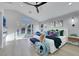 Spacious main bedroom with a sitting area and access to the outdoor pool area at 1594 Pontine Ct, Henderson, NV 89052