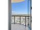 Open-air balcony view showcasing the surrounding city of Las Vegas with a clear blue sky in the background at 200 W Sahara Ave # 3312, Las Vegas, NV 89102