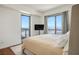 Bedroom with large windows and city view at 200 W Sahara Ave # 3312, Las Vegas, NV 89102