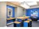 Chic common area showcasing modern decor, blue accent wall, unique lighting, and communal seating at 200 W Sahara Ave # 3312, Las Vegas, NV 89102