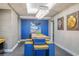 Upscale common area displaying modern lighting, blue accent wall, and wood decor to enhance community gathering at 200 W Sahara Ave # 3312, Las Vegas, NV 89102