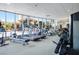Bright gym featuring a variety of modern exercise equipment and large windows overlooking outdoor scenery at 200 W Sahara Ave # 3312, Las Vegas, NV 89102