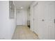 Bright hallway with tile flooring, multiple entryways, and closet space for a clean, organized aesthetic at 200 W Sahara Ave # 3312, Las Vegas, NV 89102