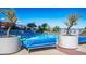 Sparkling community swimming pool with lounge seating and well-maintained landscaping with mountain views at 200 W Sahara Ave # 3312, Las Vegas, NV 89102