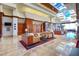 Bright and spacious lobby with high ceilings, modern furniture and skylights at 2091 Waterton Rivers Dr, Henderson, NV 89044